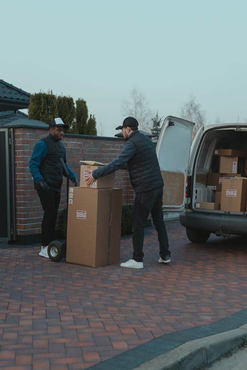 Men Delivering Parcels