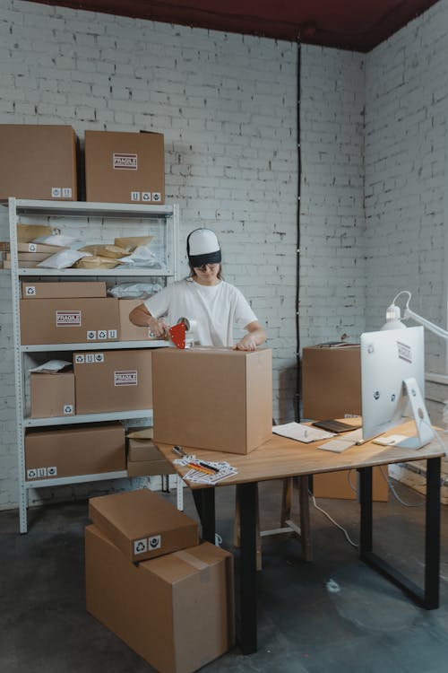 Man in White Chef Uniform Sitting on Chair