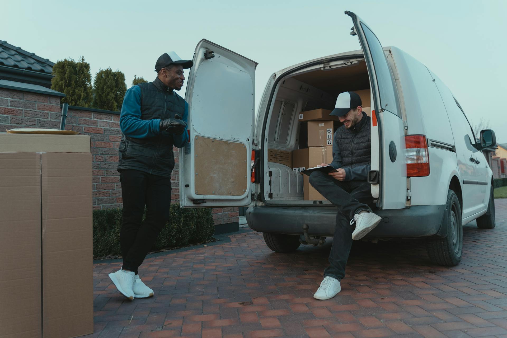 Delivery Men talking with each other