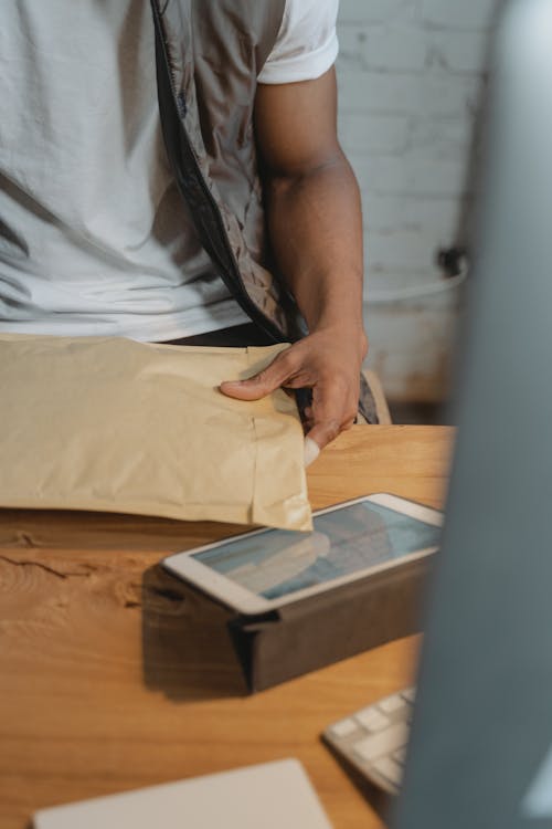 Person holding a Parcel 