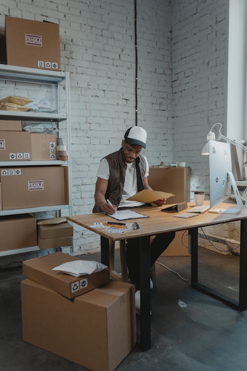 Business Man writing on a Paper