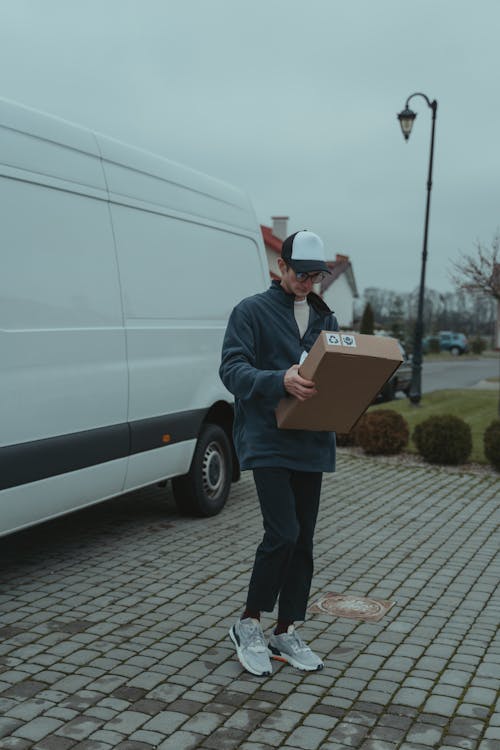 Delivery Man Carrying a Box