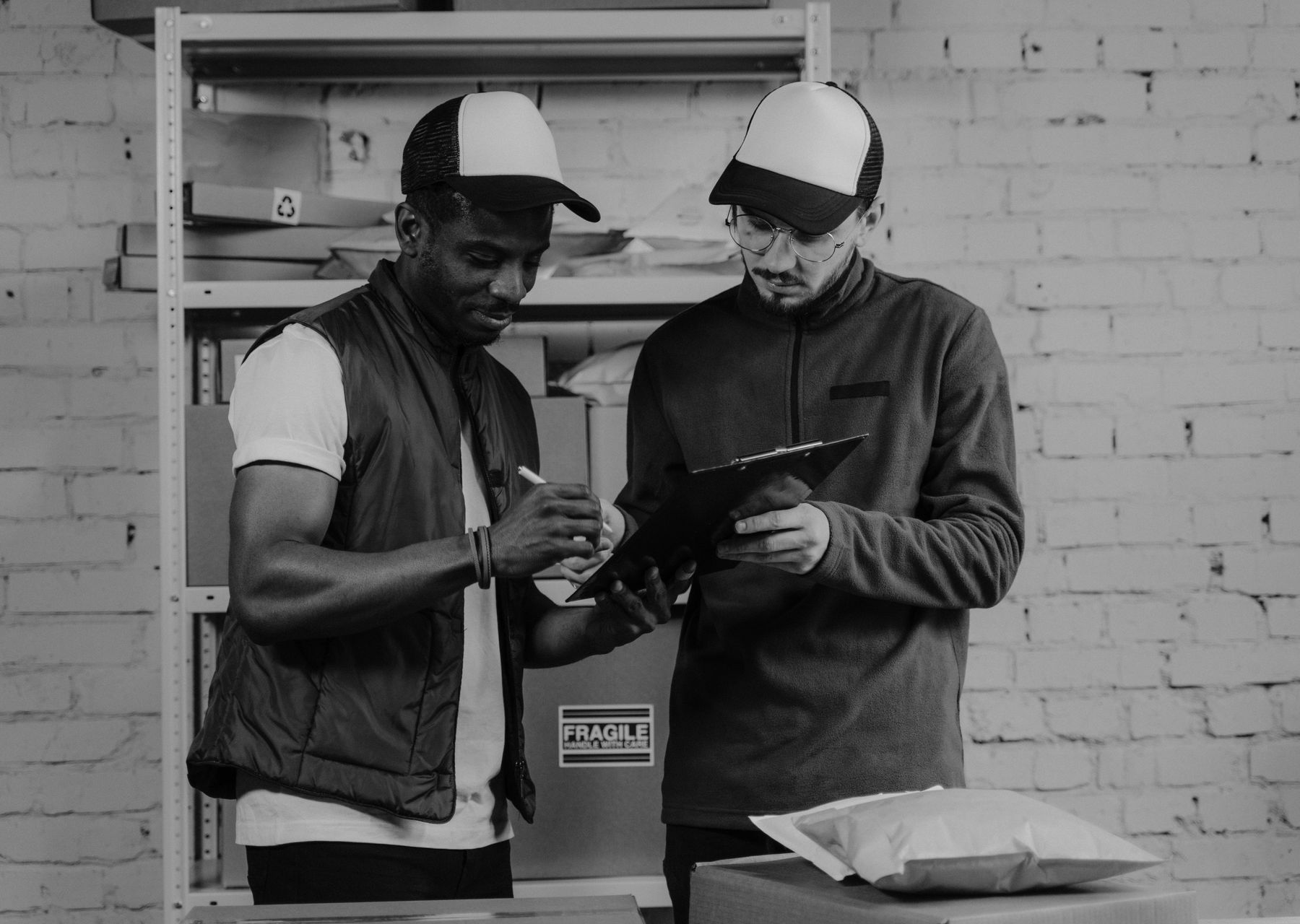 Professional removals crew at work — storage & moves to storage Wing