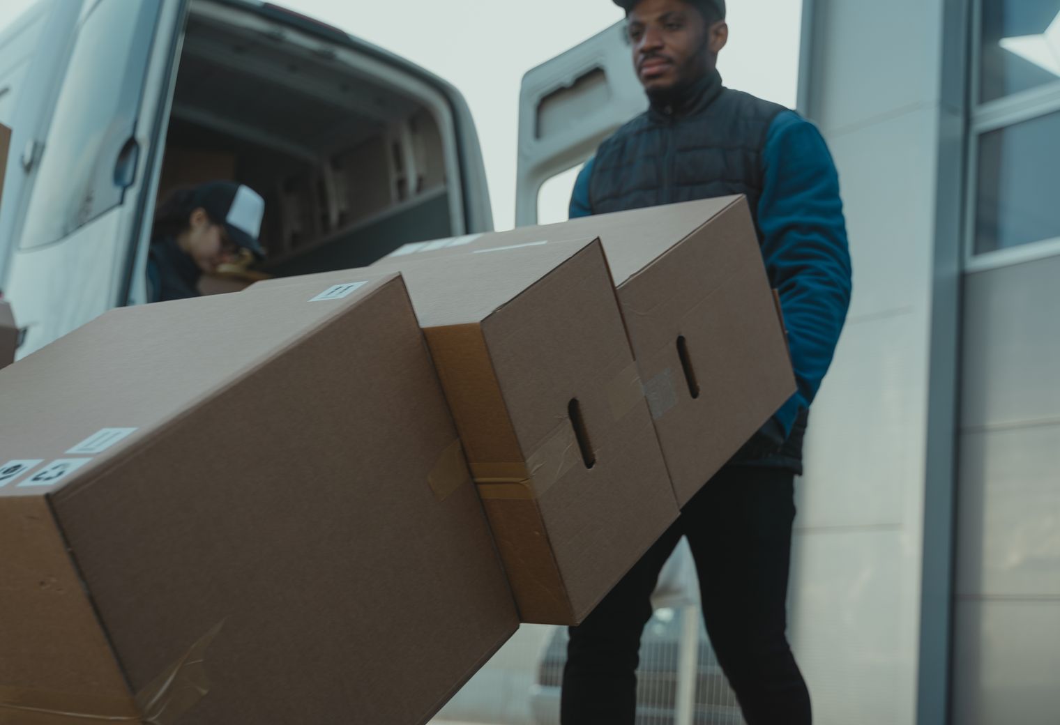 Rock — professional packers wrapping and boxing belongings