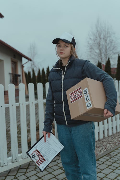 A Woman Making a Package Delivery