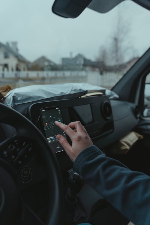 Person using Black Android Smartphone