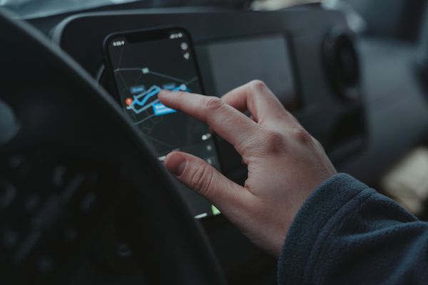 Driver using in-cab GPS navigation to optimize a freight route