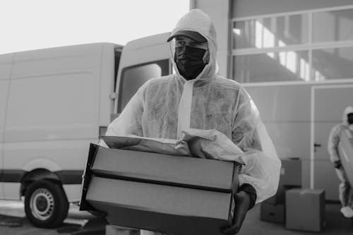 A Delivery Man Carrying Packages