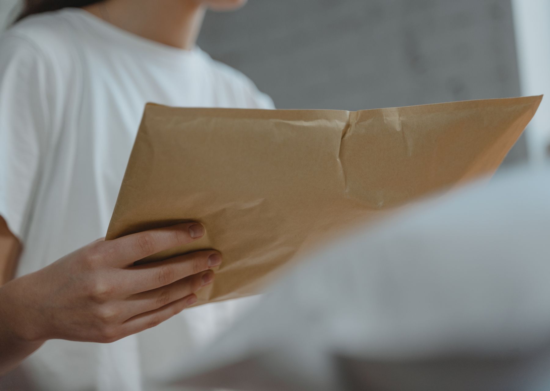 Packing services in Caxton — crew wrapping and loading on moving day