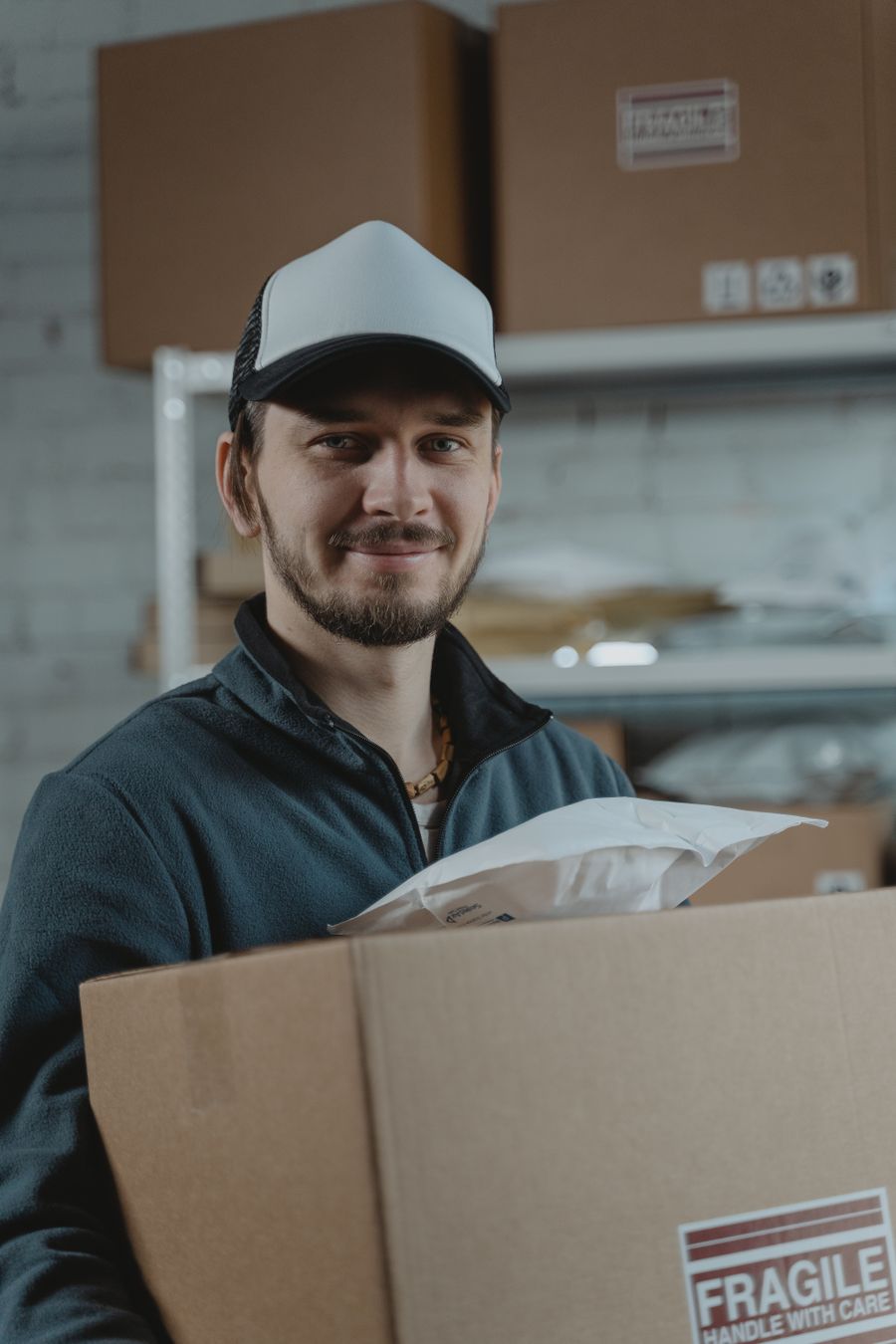 Warehouse worker preparing delivery packages