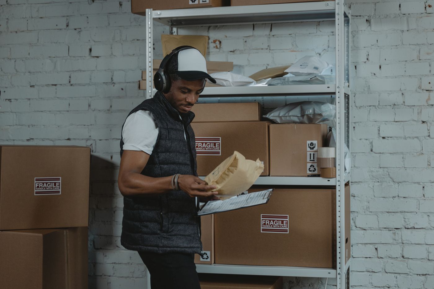 Parcel worker handling packages in a logistics operation