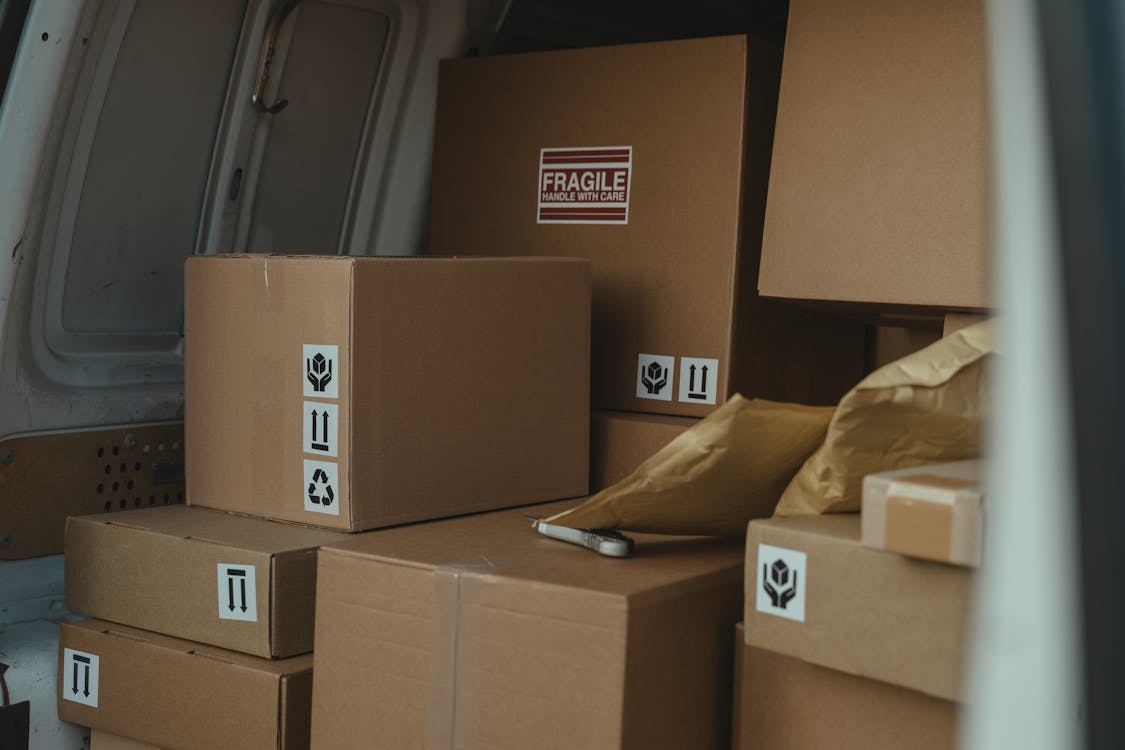 Free Parcels Inside a Delivery Van Stock Photo
