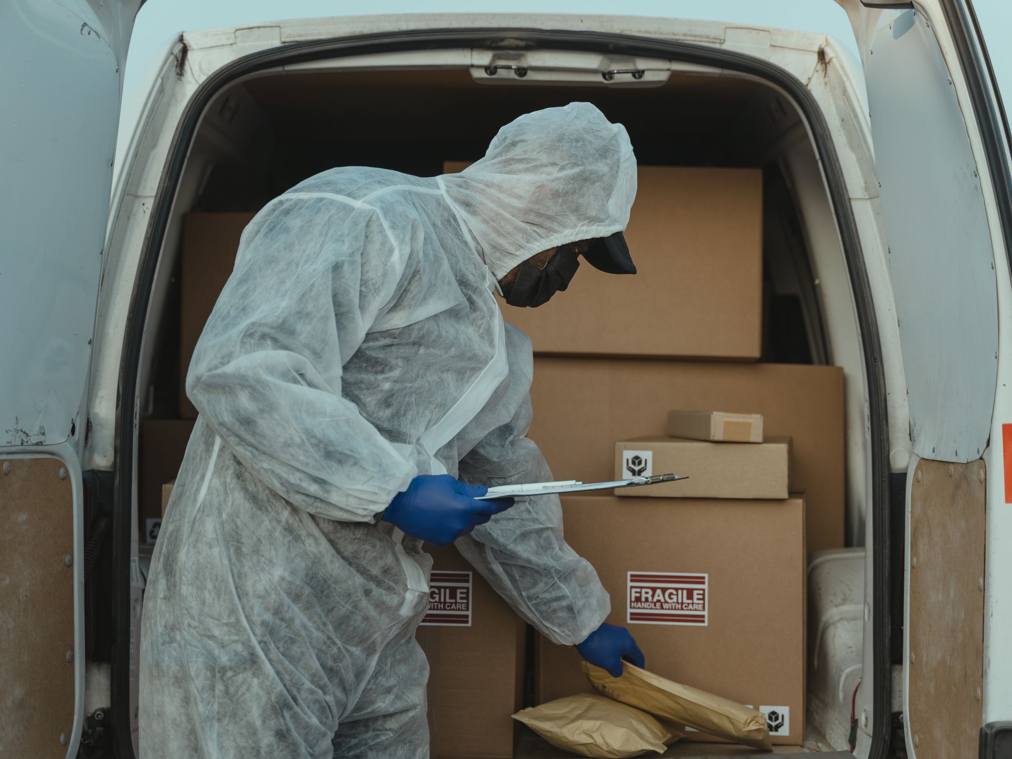 House Clearance in Great Waldingfield, East of England — house clearance team loading furniture into a van