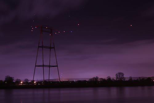 Foto stok gratis bayangan hitam, langit malam, menara listrik