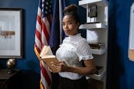 Professional Woman holding a Book