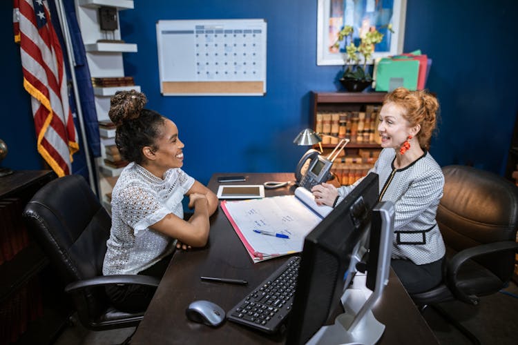 High Angle Shot Of Women Talking With Each Other 