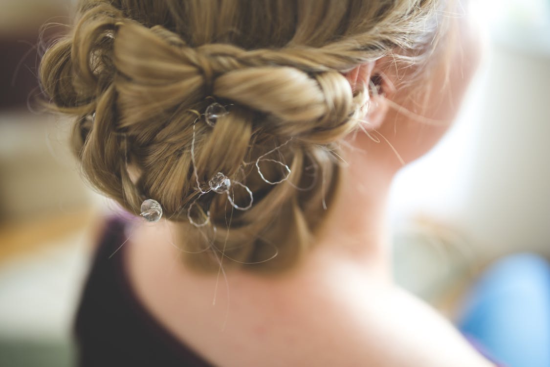 Free Bride's hair, styled with a hair ornament Stock Photo