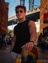Man in Black Tank Top Wearing Black Sunglasses