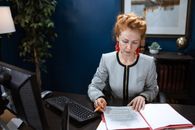 Photo Of Woman Doing Paperwork