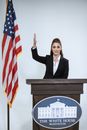 Woman in Black Blazer Beside USA Flag
