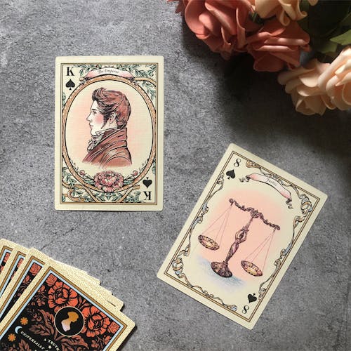 Free Two Tarot Cards on a Gray Surface Stock Photo
