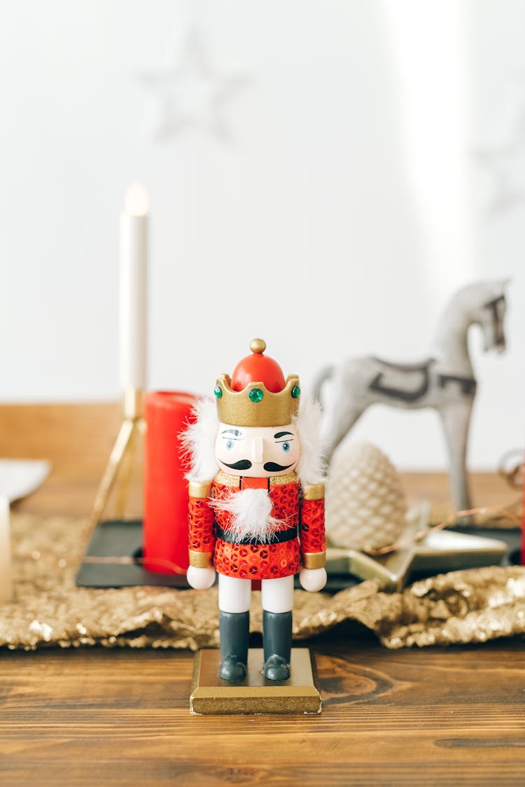 Nutcracker Figurine On Wooden Table