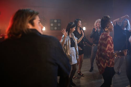Free People Dancing in a Nightclub Stock Photo
