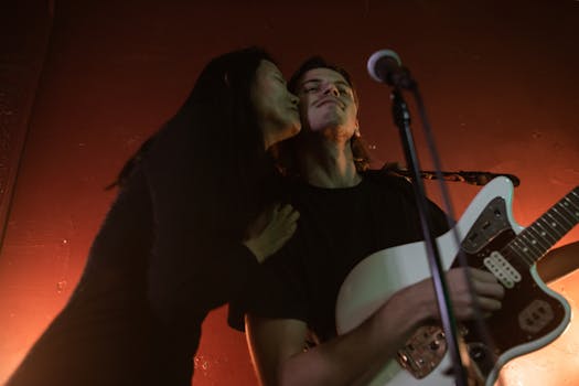 Justin Bieber shares a stage kiss, sparking reactions from Bollywood and wife Hailey Bieber.  Celebrity news,  stage kiss.