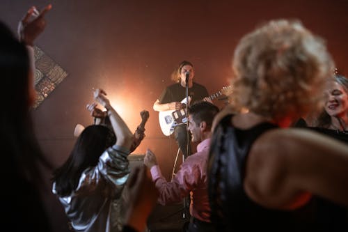 Free Person on the Stage Playing Electric Guitar Stock Photo