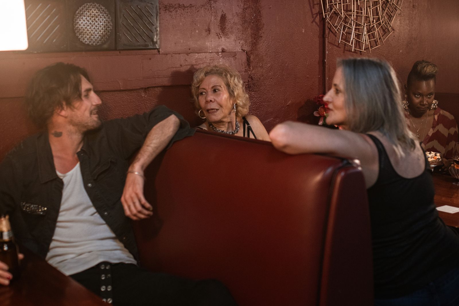 Friends together at a table in a bar