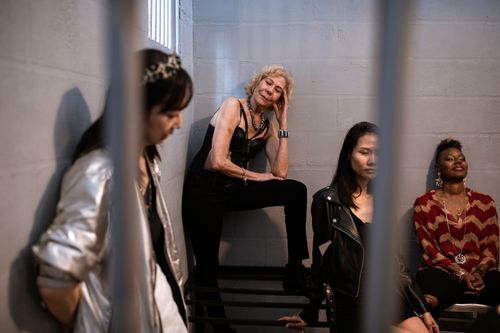 Free A diverse group of women in a holding cell, expressing contemplation and emotion. Stock Photo