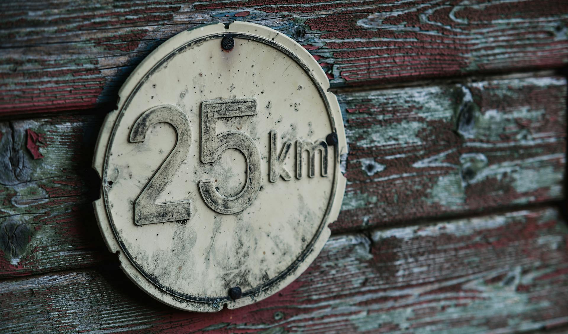 Round Gray 25 Km Signage