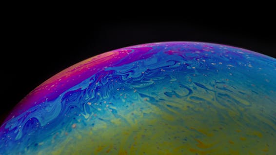 Round multicolored abstract sphere on dark background