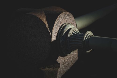 Free Aged railings with dry ribbed surface with tiny spots and shadow on geometric decoration Stock Photo