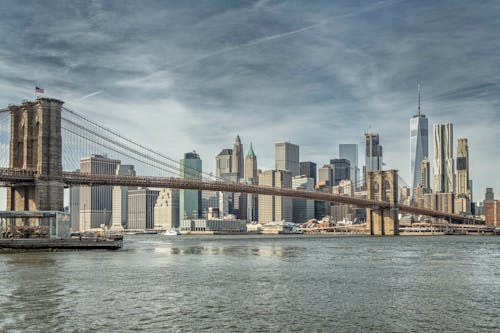 City Skyline Under Gray Cloudy Sky