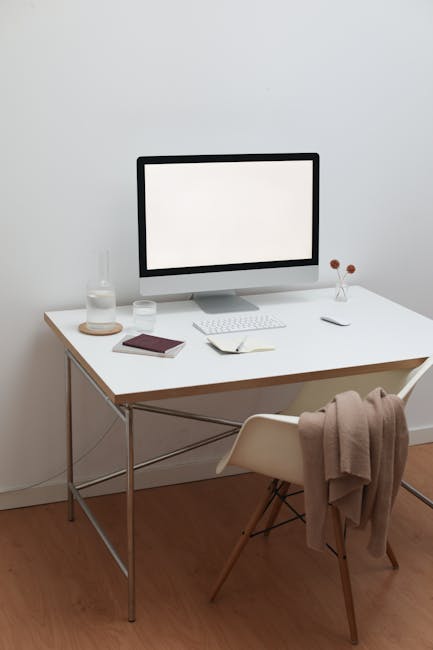 Workplace with wireless gadgets and books