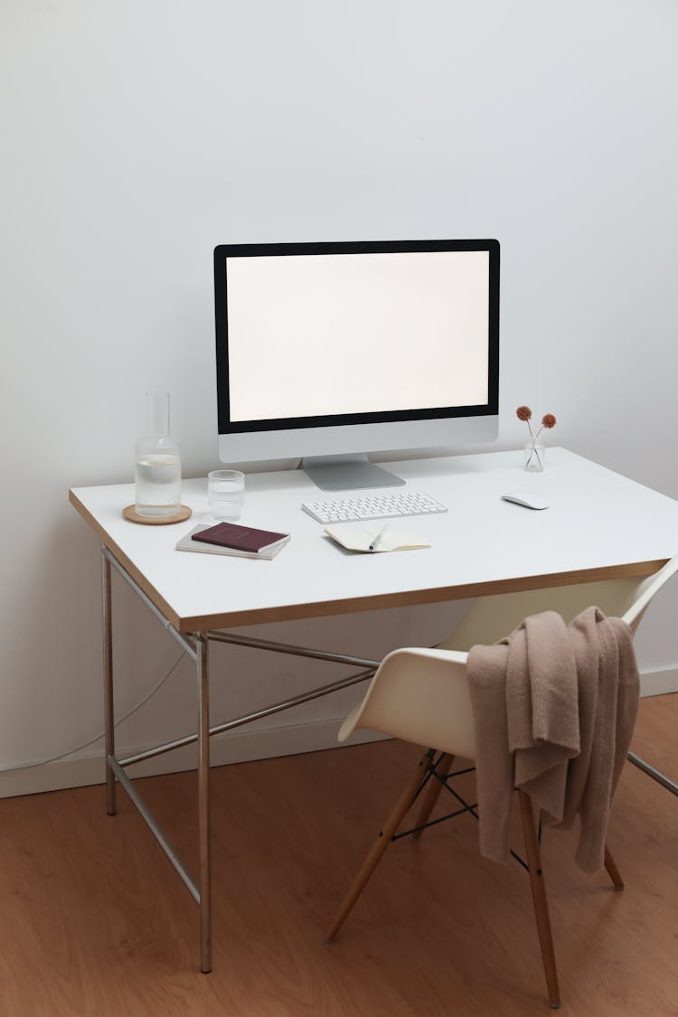 Workplace With Wireless Gadgets And Books