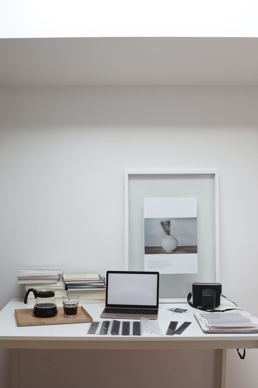 A quiet, low-lit studio in morning light