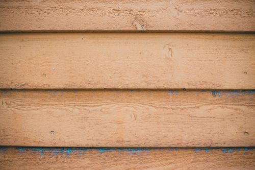 Free Full frame background of shabby wooden wall made of planks painted with beige color Stock Photo