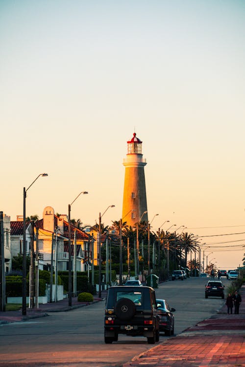 Free Cars on the Street with the View of Punta del Este Lighthouse, Maldonado, Uruguay Stock Photo
