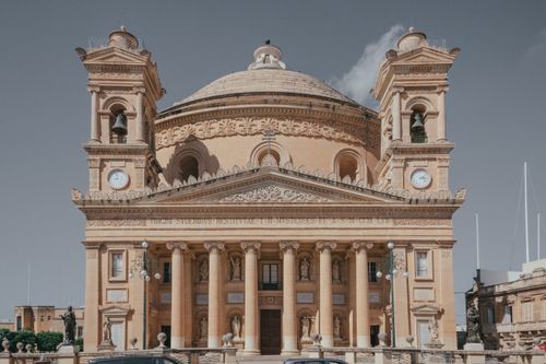 Free Front view of the Rotunda of Mosta, a stunning architectural landmark in Malta. Stock Photo