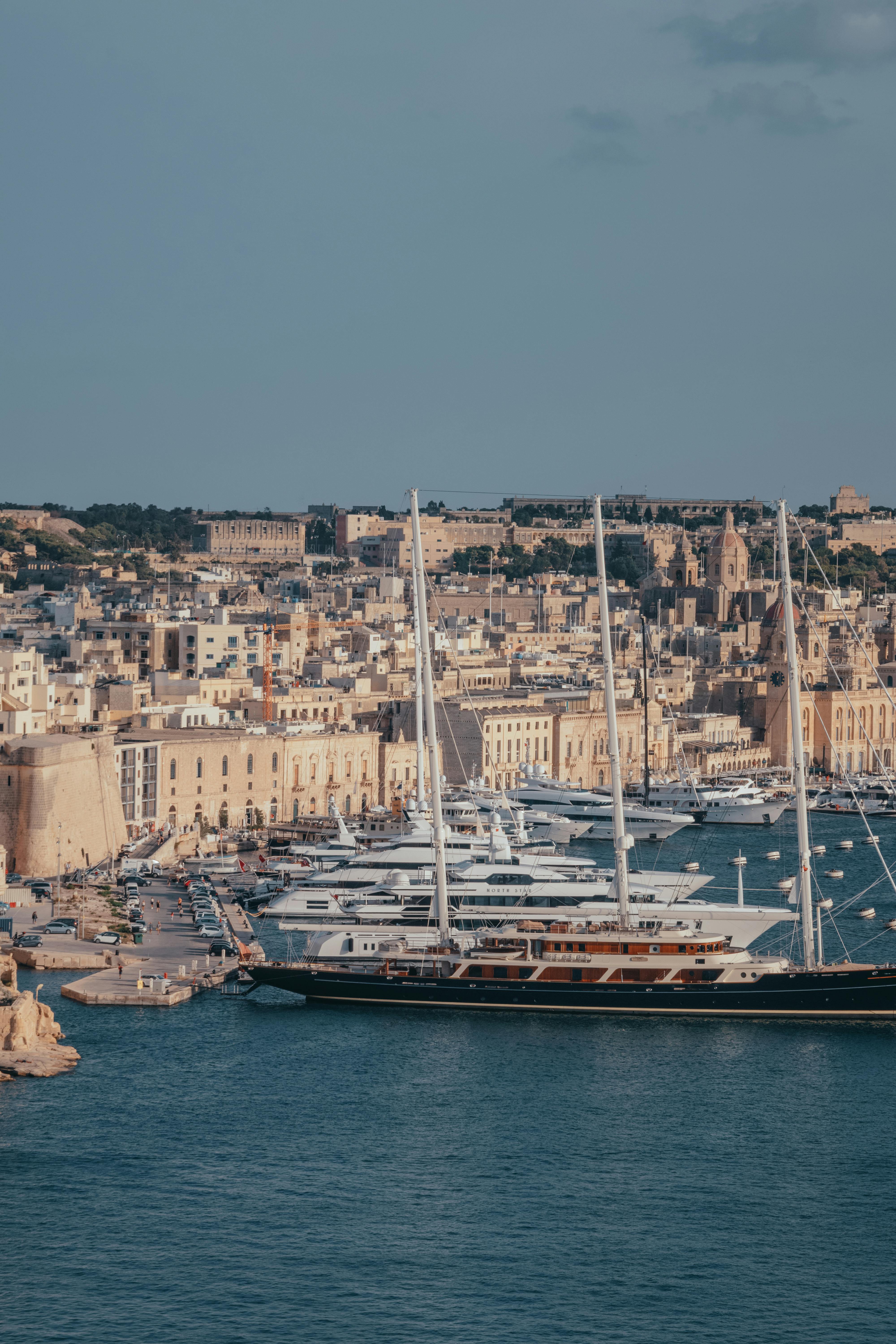 Free Discover Malta's stunning waterfront with historic architecture and luxury yachts. Stock Photo