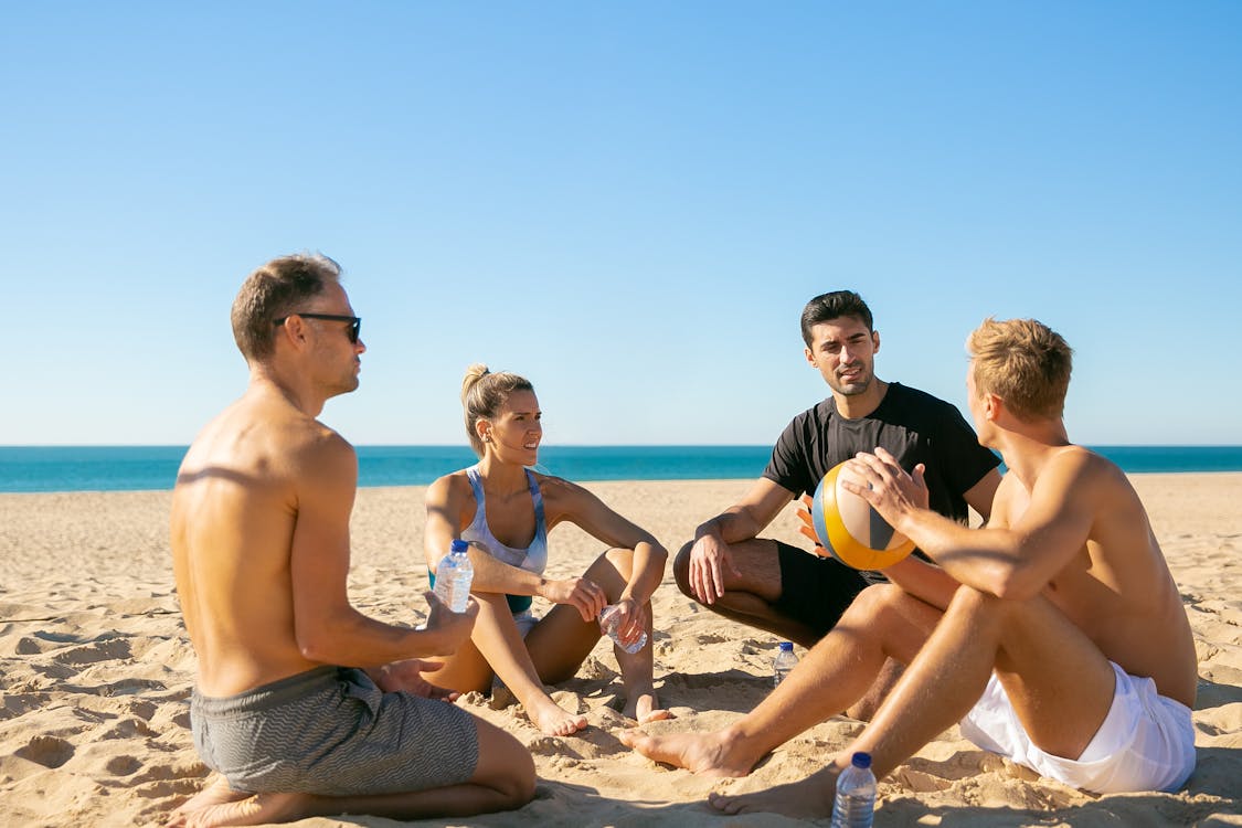 People Sitting on the Sand