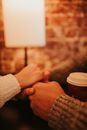 Anonymous couple sitting in cafe on date