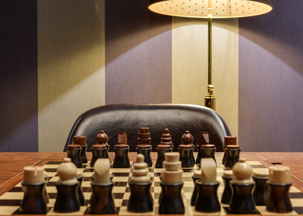 brown chess board with figures on a wooden table in a cafe, playing chess  Stock Photo - Alamy