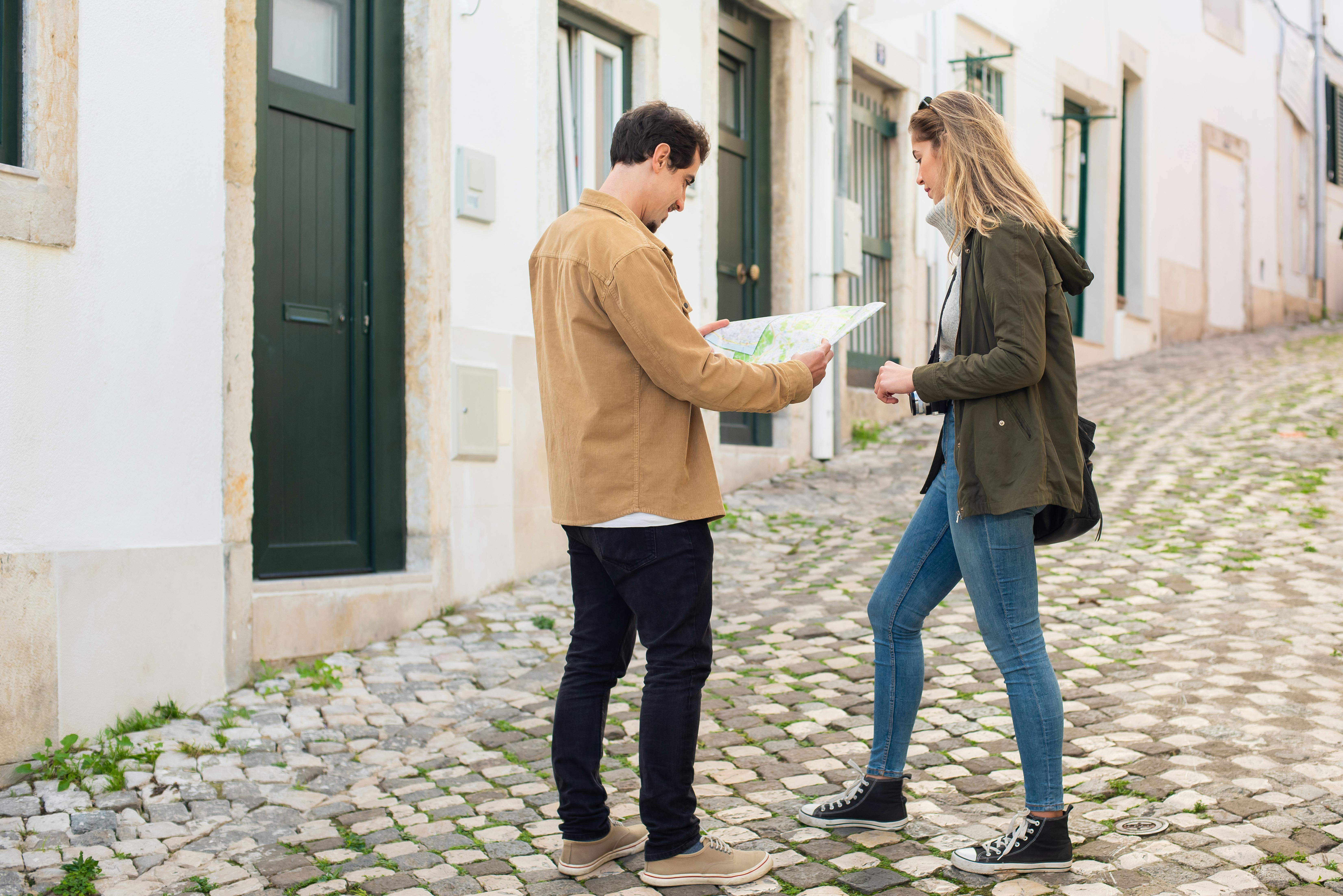 A first-time traveler with a backpack exploring a city on a budget.