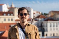 A Man Smiling at the Camera