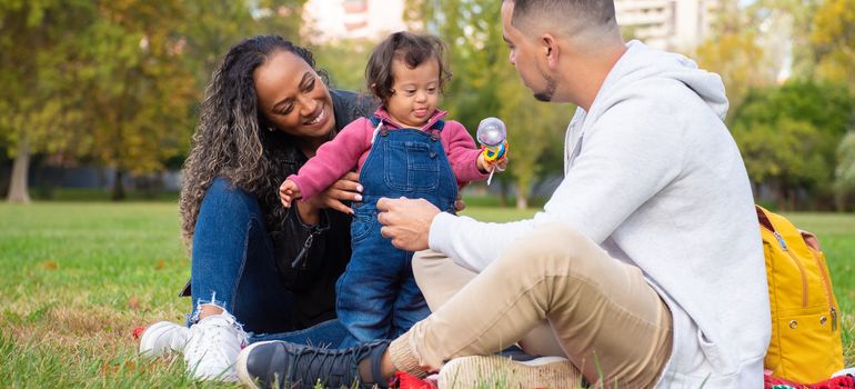 Family relaxing in a public park