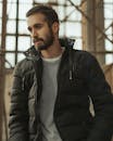 A Bearded Man Wearing a Black Jacket
