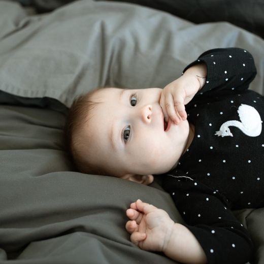 Baby nursery with coordinated bedding collection
